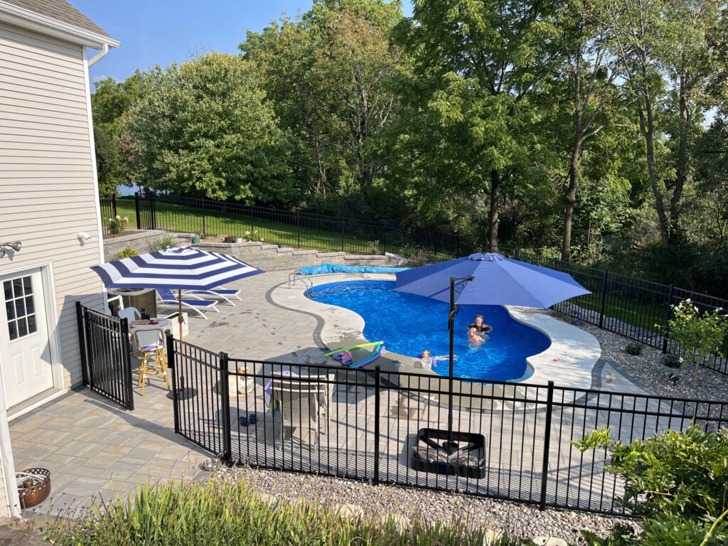 14 x 28 Gemini pool with paver patio and retaining walls in Canandaigua, NY