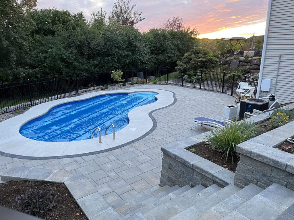 14 x 28 Gemini pool with paver patio and retaining walls in Canandaigua, NY