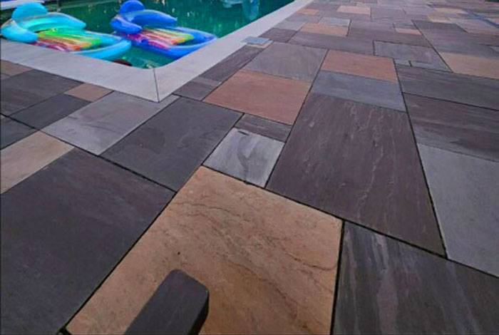 Pool-side patio with custom pavers